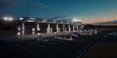 ev charging stations at a highway fast charging plaza at dusk